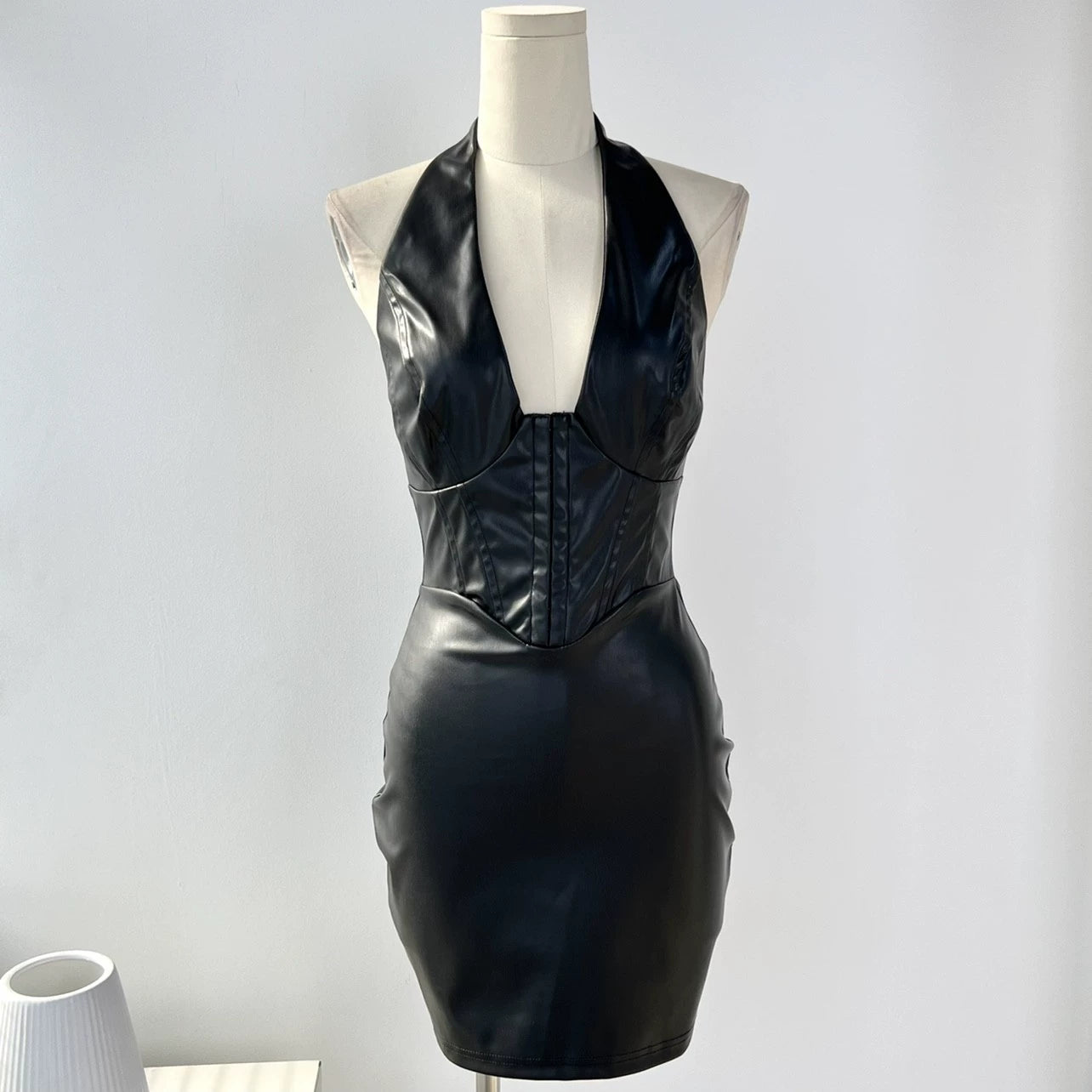 Seductive Deep V-neck PU Leather Dress: Versatile Fashion Statement